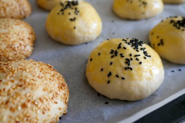 raw pastry dough sprinkled with black cumin,