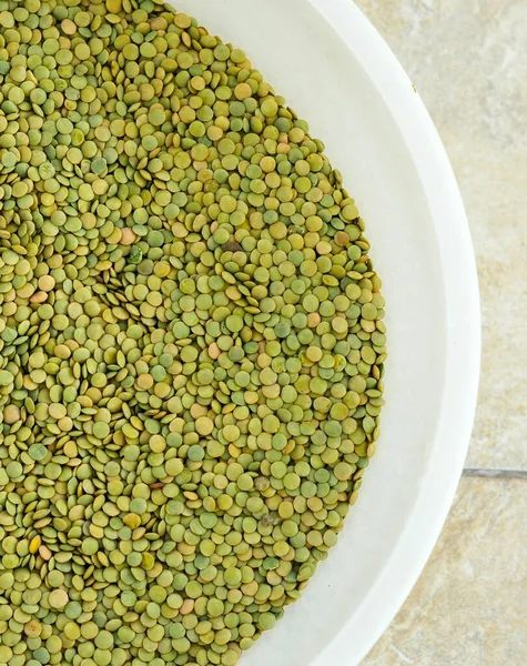 green lentils,dry edible green lentils close-up,