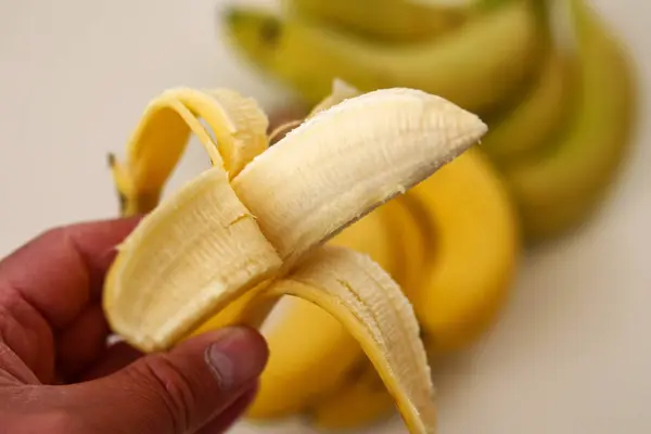 Person Holds Half Peeled Ripe Banana His Hand Close Banana — Stock Photo, Image