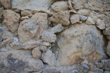 Girit 'teki harabe bir Yunan evinin antik taş duvarı. Yüksek kalite fotoğraf