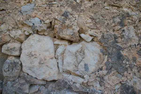 Girit 'teki harabe bir Yunan evinin antik taş duvarı. Yüksek kalite fotoğraf