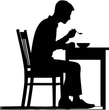 Masada yemek yiyen bir insanın silueti.