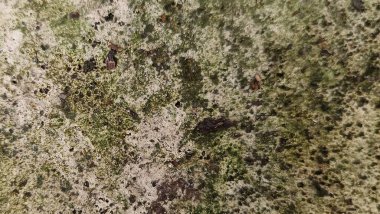 Arka plan Doğal taş yüzeyi ve doğal dokunun yakın çekimi.