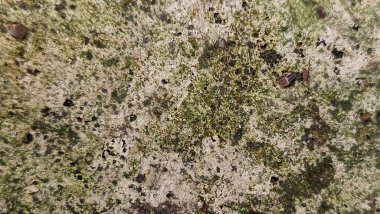 Arka plan Doğal taş yüzeyi ve doğal dokunun yakın çekimi.