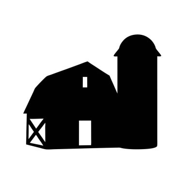 Klasik bir ahır ve silonun silueti, tarım ve kırsallığı betimliyor.
