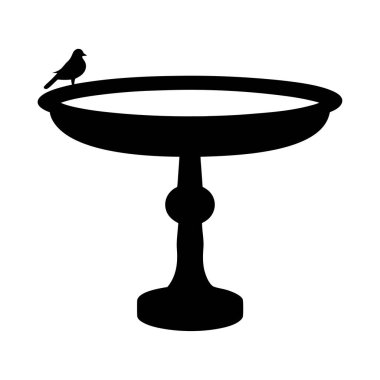 Kuş banyosundaki bir kuşun silueti ferahlatıcı suyun tadını çıkarıyor.