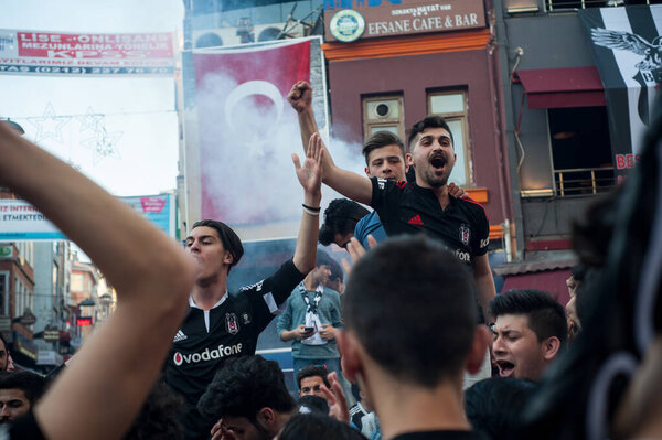 Istanbul, Turkey, May 8th 2016 Besiktas Carsi football supporters singing songs before a match in Istanbul, Turkey.