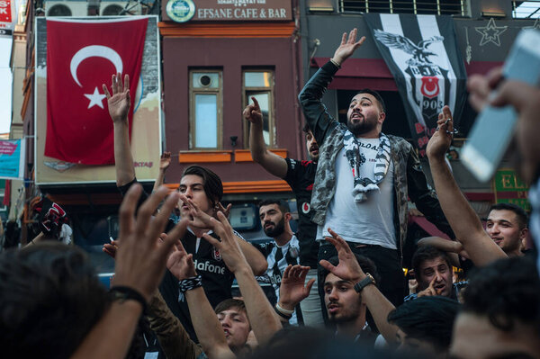 Istanbul, Turkey, May 8th 2016 Besiktas Carsi football supporters singing songs before a match in Istanbul, Turkey.
