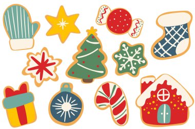 Noel kurabiyeleri ağaç, eldiven, çorap, yıldız, şeker kamışı, hediye, süs, kar tanesi ve renkli kremayla süslenmiş ev de dahil olmak üzere şenlikli şekillerde..