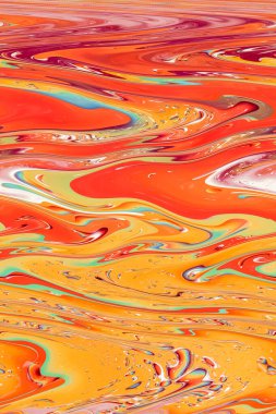 Distorted photo, abstract background in yellow-orange tones. Psychedelic, colorful pattern. Vertical photo