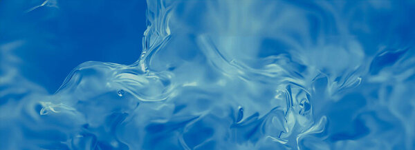 Макро гелевой текстуры косметических средств. прозрачный крем на мягком голубом фоне с пузырями. Andy ФИО, фото. размытие и избирательное фокусирование