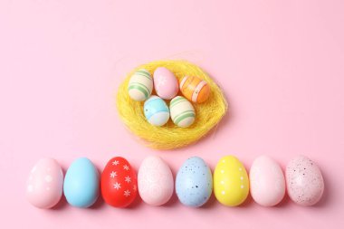 colorful easter eggs on color background