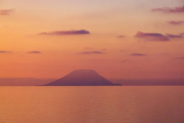 stock image Stromboli Island with an Active Volcano in Tyrrhenian Sea. Italy. Sunny Morning Sunrise Sky. Nature Background