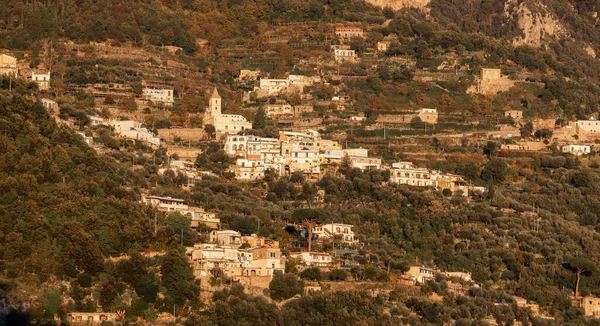 stock image Touristic Town, Positano, on Rocky Cliffs and Mountain Landscape by the Tyrrhenian Sea. Amalfi Coast, Italy. Sunny Sunset