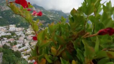 Touristic Town, Positano, on Rocky Cliffs and Mountain Landscape by the Tyrrhenian Sea. Amalfi Coast, Italy. Slow Motion Cinematic Pan