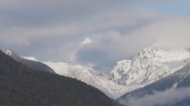 Canadian Mountain Landscape Nature Background. Sunny Winter Day. Howe Sound near Squamish, British Columbia, Canada. Slow Motion Cinematic