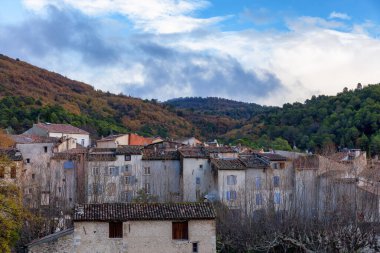 Homes in a small touristic town, Montferrat, France. Cloudy Fall Season Sky.