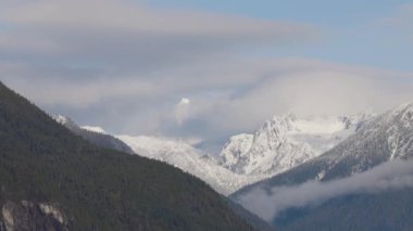 Canadian Mountain Landscape Nature Background. Sunny Winter Day. Howe Sound near Squamish, British Columbia, Canada. Slow Motion Cinematic