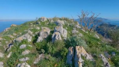 Touristic Town on Capri Island in Bay of Naples, Italy. Sunny Blue Sky. Nature Background. View from top of Mountain. Slow Motion Cinematic Pan