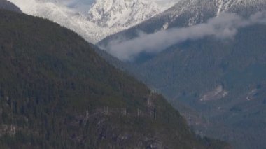 Canadian Mountain Landscape Nature Background. Sunny Winter Day. Howe Sound near Squamish, British Columbia, Canada. Slow Motion Cinematic