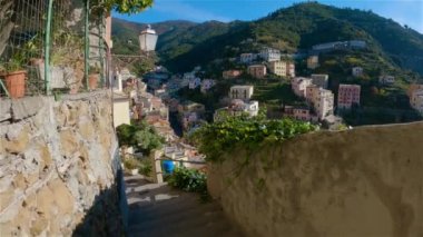 Colorful apartment homes in touristic town, Riomaggiore, Italy. Cinque Terre National Park. Slow Motion cinematic