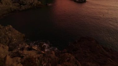 Small touristic town on the coast, Manarola, Italy. Cinque Terre. Colorful Sunny Sunset Fall Season. Slow Motion Cinematic