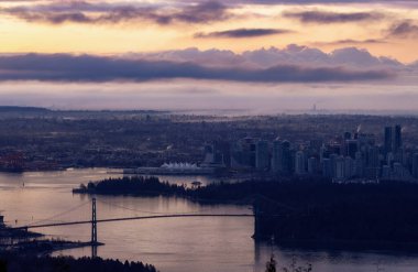 Urban Downtown City and Stanley Park in Vancouver, British Columbia, Canada. Winter Sunrise.