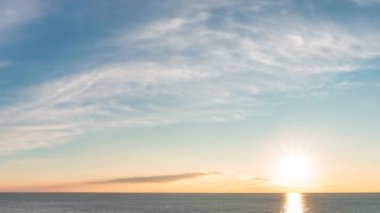 Dramatic Colorful Sunset Sky over Mediterranean Sea. Cloudscape Nature Background. Cinemagraph Continuous Animation Loop