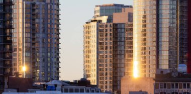 Residential Highrise Apartment Buildings in Coal Harbour, Downtown Vancouver, British Columbia, Canada. Winter Sunrise