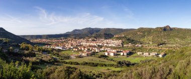 Homes and Apartments in Touristic Town. Bosa, Sardinia, Italy. Sunny Fall Season Day. Panorama