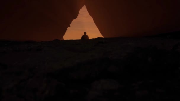 Man Standing Rocky Cave Sunrays Adventure Composite Rendering Sunny Sunset — Stock Video