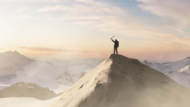 Adventurous Man Hiker Standing Top Icy Peak Rocky Mountains Background — Stock Video