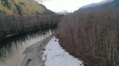 River, Mountains and Forest in Canadian Nature Landscape Background. Aerial View. Squamish Valley, British Columbia, Canada.