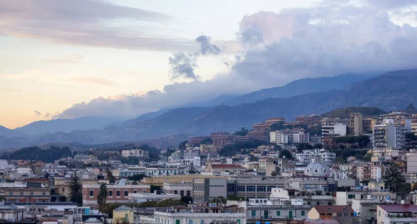 stock image Homes and Apartment Buildings in a touristic city Messina, Sicilia, Italy. Cloudy Sunrise Sky. Aerial