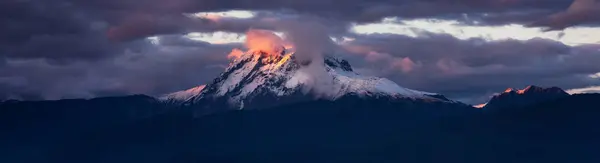 Mountain Peak Covered Clouds Snow Dramatic Sunset Sky Aerial Nature — Stock Photo, Image