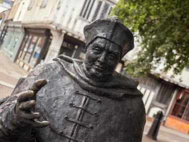 IPSWICH, SUFFOLK, UK - AUGUST 11, 2018:    Closeup of the statue of Cardinal Thomas Wolsey in St Peter's Street by David Annand