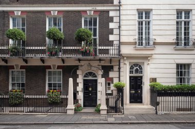 LONDON, UK - AUGUST 25, 2018:  Exterior view of Georgian terraced houses in Mayfair