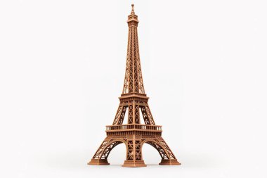 Detaylı, kahverengi Eyfel Kulesi hatıra modeli temiz beyaz arka planda izole bir şekilde duruyor. Bu minyatür Paris simgesi, tatilleri resmetmek için ideal bir seyahat ve turizm görüntüsü sunuyor....