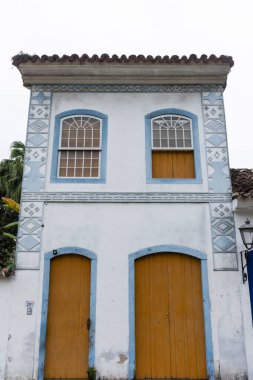 Beautiful view to masonic symbols on facade of small houses in colonial historic town, Paraty, Rio de Janeiro, Brazil