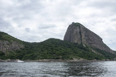 Beautiful view from the ocean to Sugar Loaf rainforest mountain in Rio de Janeiro, Brazil