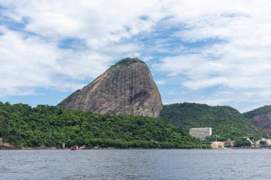 Beautiful view from the ocean to Sugar Loaf rainforest mountain in Rio de Janeiro, Brazil
