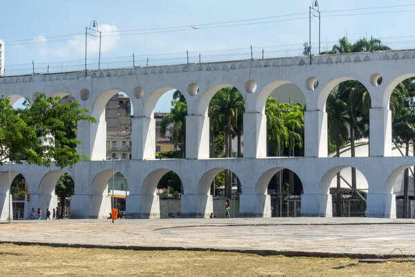 Beautiful view to old historic white aqueduct in Lapa, downtown Rio de Janeiro, Brazil