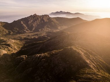 Beautiful aerial drone view to rocky mountains and altitude fields in Itatiaia National Park, Rio de Janeiro, Brazil
