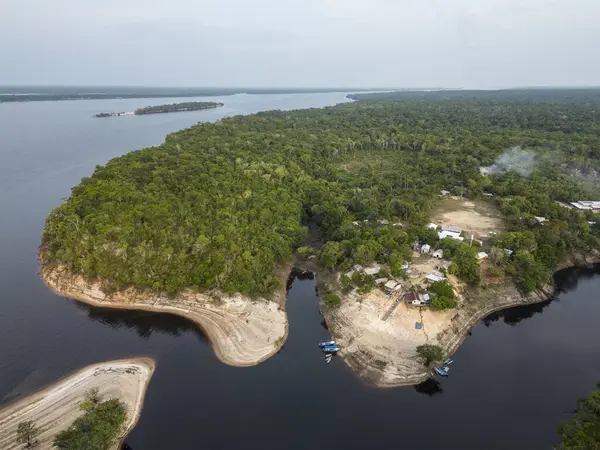 Beautiful aerial view to Santo Antonio riverside community in green amazon rainforest, RDS Rio Negro, Amazonas, Brazil
