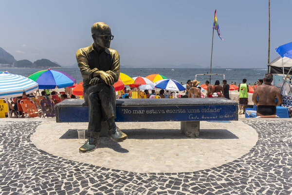 Beautiful view to Carlos Drummond de Andrade statue in Copacabana Beach, Rio de Janeiro, Brazil