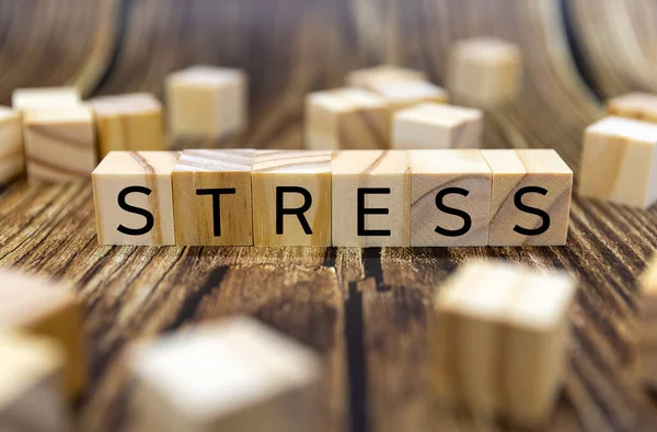stock image Stress - word from wooden blocks with letters, great worry caused by a difficult situation stress concept