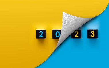 Yeni yıl 2022 'den 2023' e elle yükleme işlemi çubuğuna ahşap küp konuyor. 2023 yılına hedef planı, hedef konsepti ve stratejiyle başla.