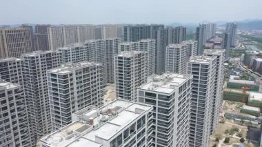 Xiaoshan bölgesi Hangzhou şehri Chin 'in inşaat halindeki yüksek binalarının havadan görüntüsü. Yüksek kalite 4k görüntü