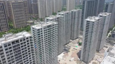 Xiaoshan bölgesi Hangzhou şehri Chin 'in inşaat halindeki yüksek binalarının havadan görüntüsü. Yüksek kalite 4k görüntü