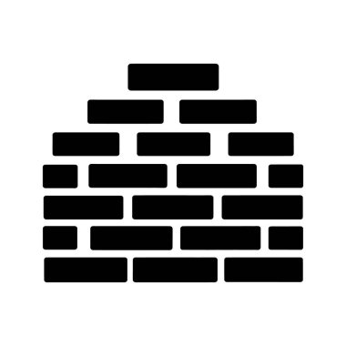 Katı siyah tuğla duvar beyaz arka planda yığılı kalıp gösteriyor, yapısal bir yapı oluşturuyor. Beyaz bir arka planda izole edilmiştir..